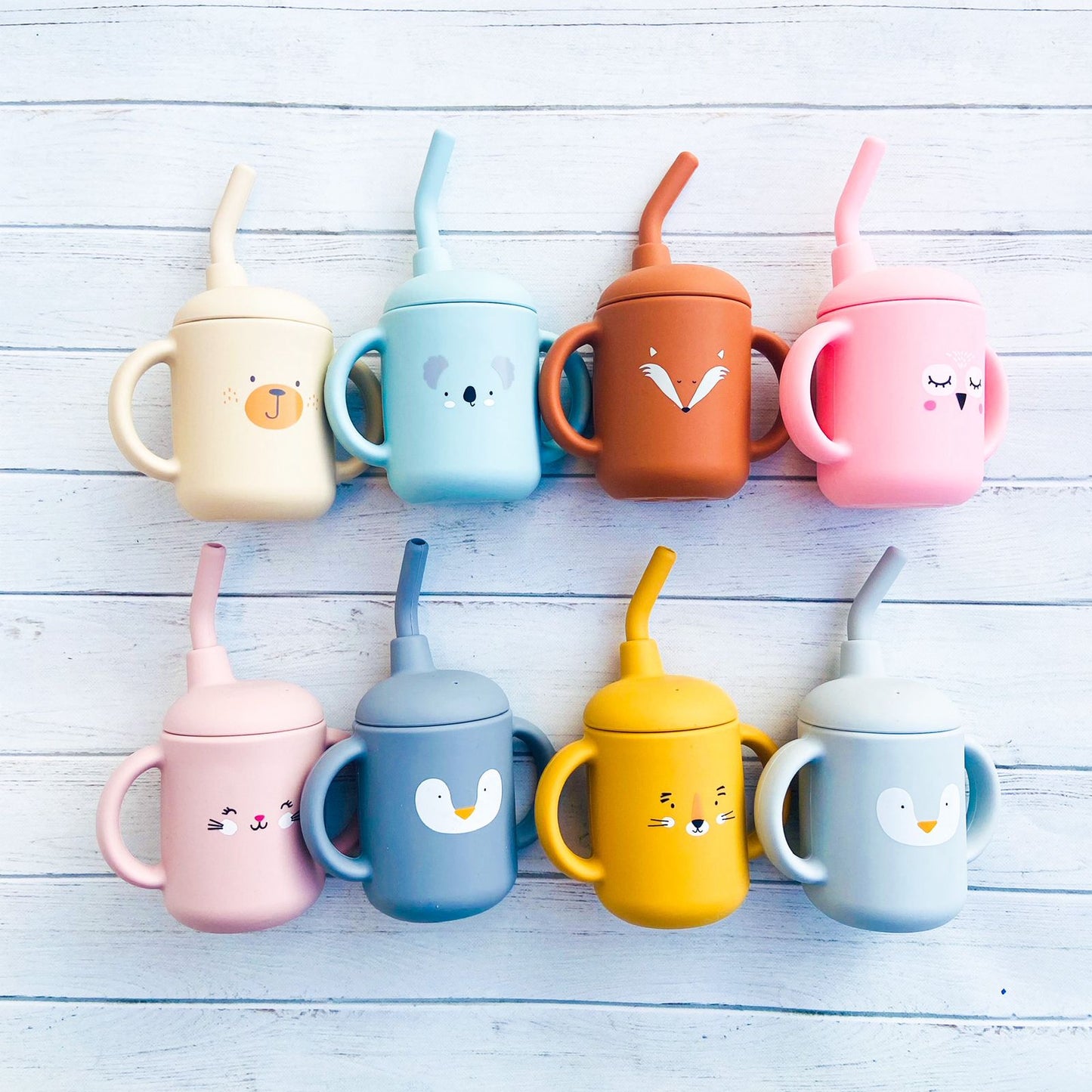 Vaso de aprendizaje con bombilla animals
