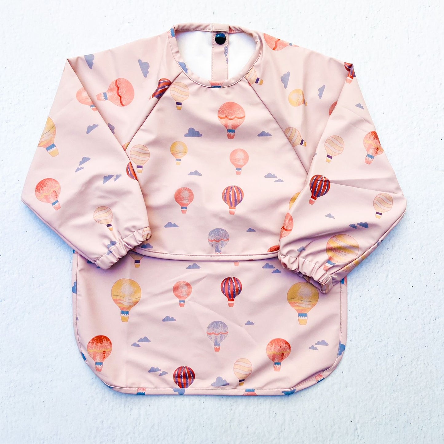 Pechera impermeable bolsillo convertible