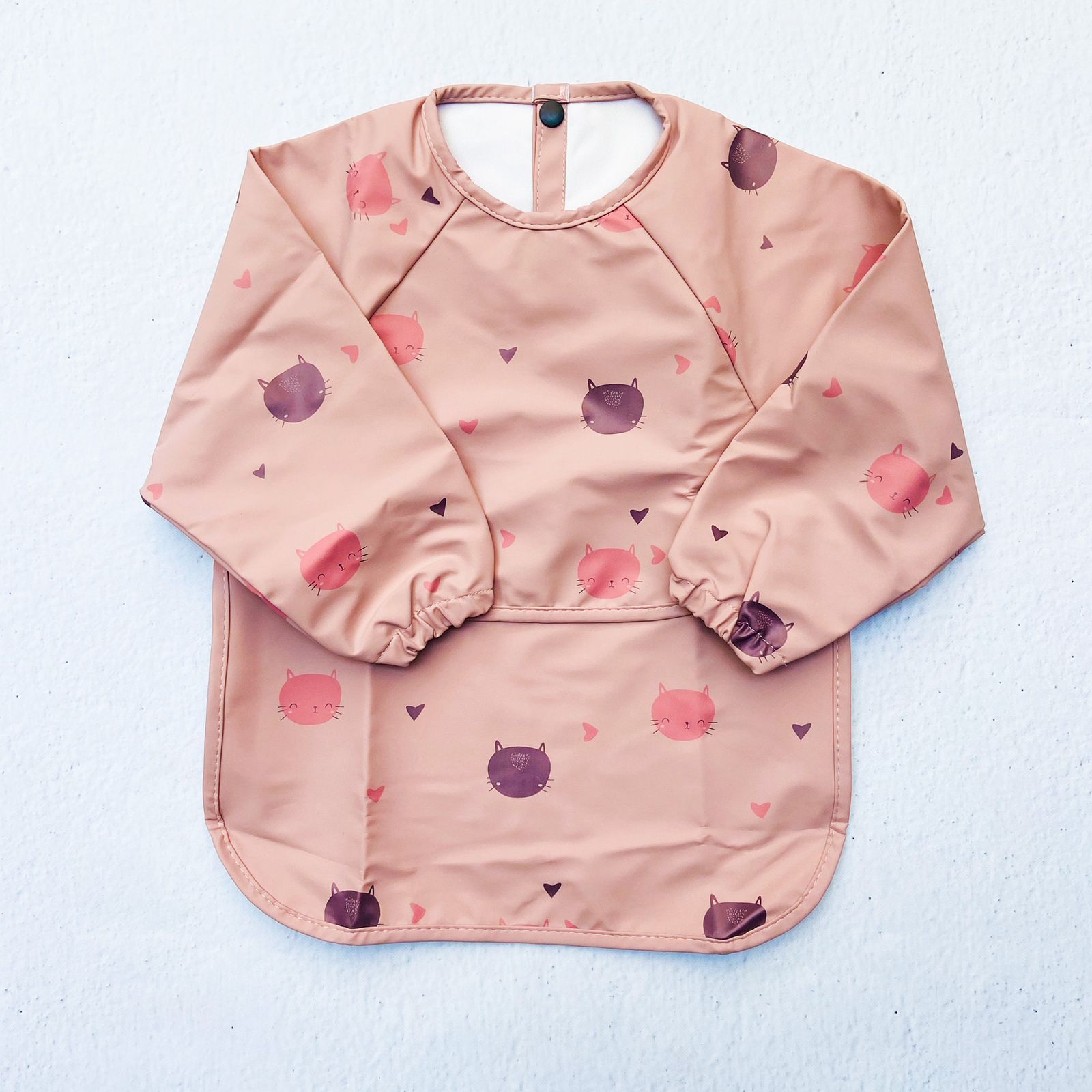 Pechera impermeable bolsillo convertible