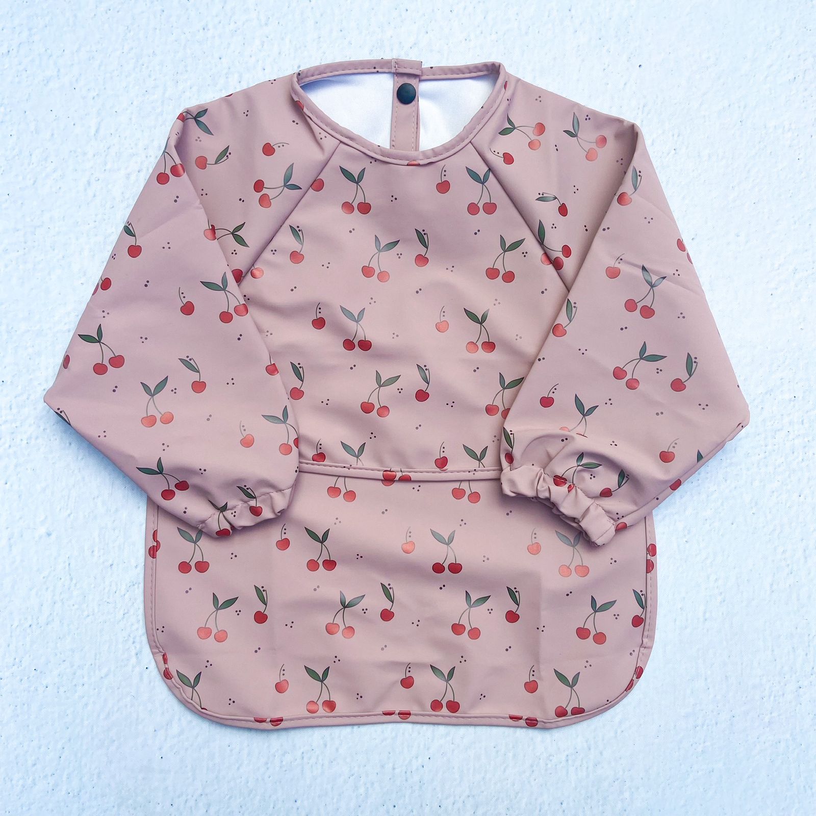 Pechera impermeable bolsillo convertible